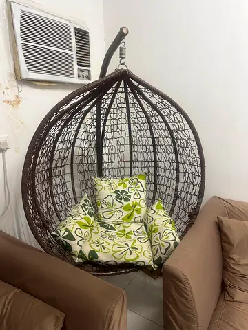 Hanging Chair with Floral Cushions