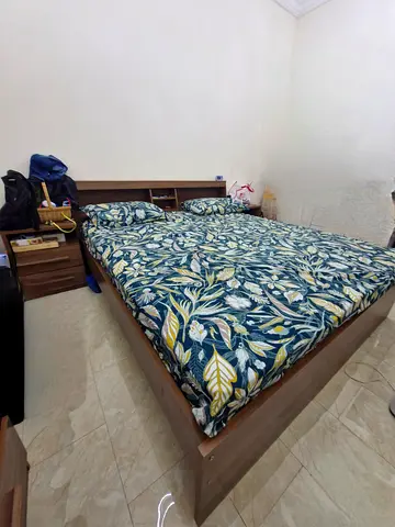 Comfortable King Size Bed with Two side tables and dressing table with 6 drawers