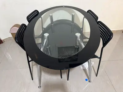 Table with Great adjustable legs and including 4chairs