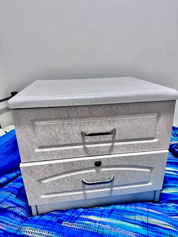 Charming White Nightstand with Sleek Drawers