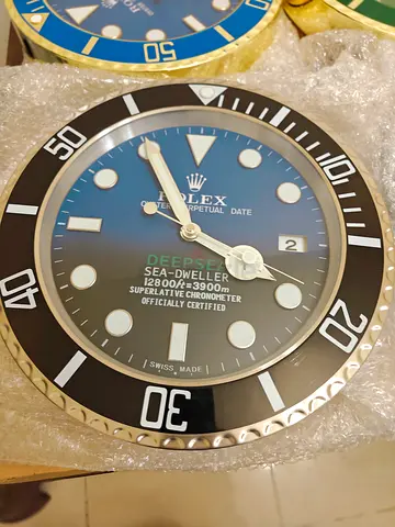 Wall clock Rolex