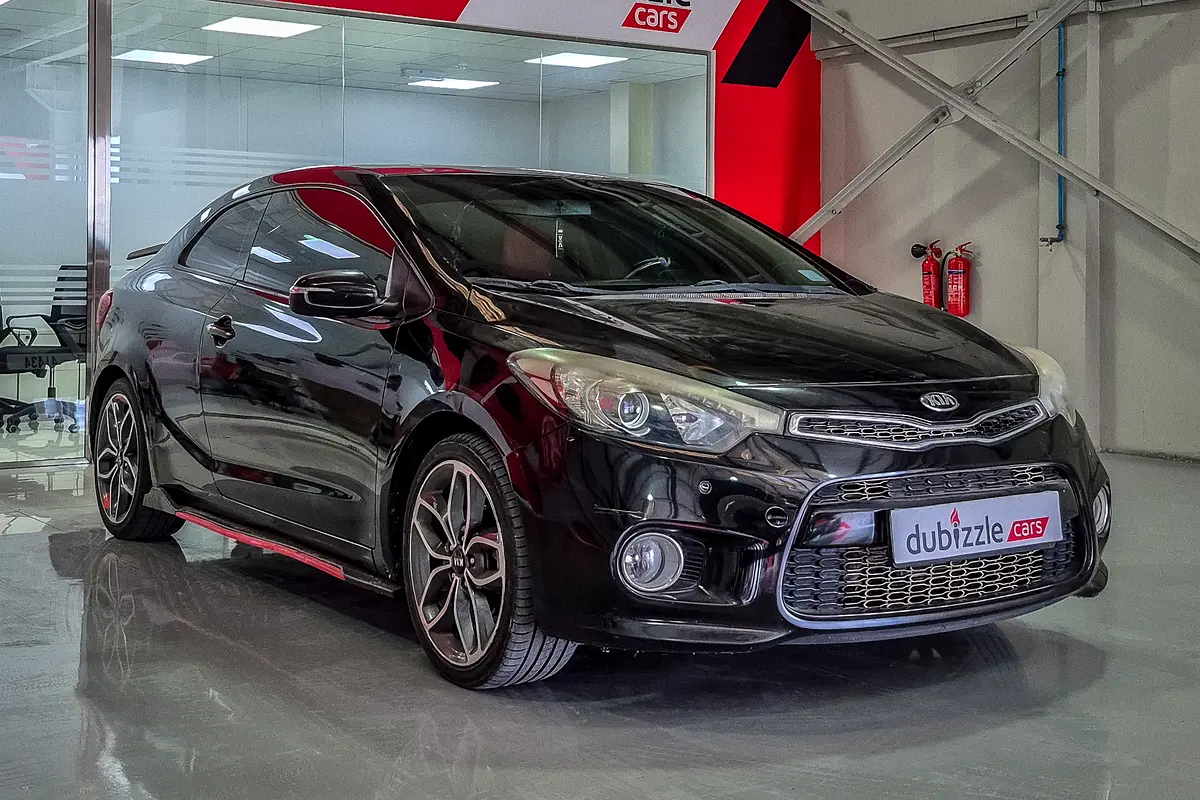 Kia Cerato 2015 — photo 1 of 13