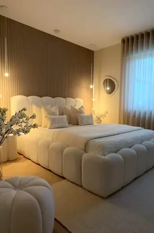 Elegant White Bed with Textured Headboard