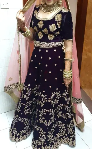 Elegant Purple Bridal Lehenga with Intricate Embroidery
