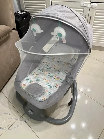 Gently Used Baby Rocker swing with Canopy and Music. Only used a few times.