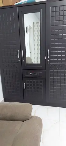 Sturdy and Stylish Black Wardrobe with Mirror