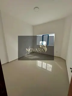 Two-bedroom apartment with a living room for annual rent in Fujairah, Tower, first occupancy, near C