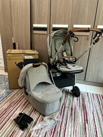 Nuna triv stroller with bassinet and adapter