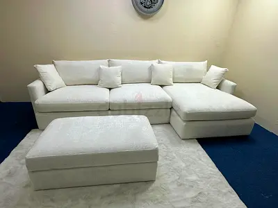 As perfect condition cratebarrel lshape sofa with footstool