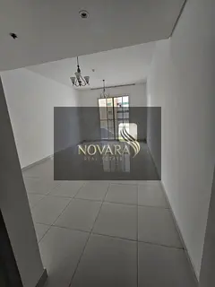 Two bedrooms and a living room available in a clean tower with spacious areas and a view of Khalifa