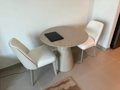Chic Modern Dining Table with Stylish Chairs