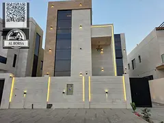 For sale in Al Helio 2, Ajman: a villa with 5 master bedrooms, a majlis, two living rooms, a spaciou