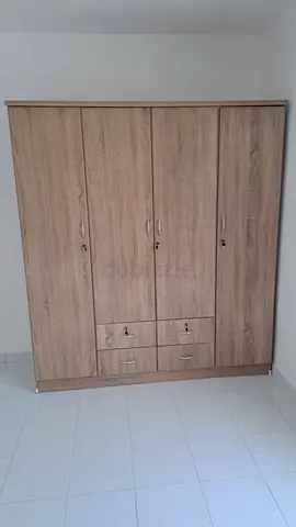 4 door wardrobe selling brand new