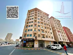 Apartment for annual rent in Al Nuaimiya area, containing two rooms and a living room, very prime lo