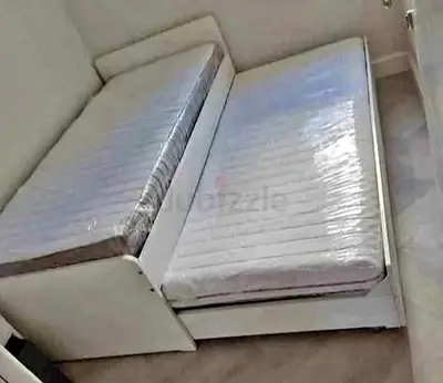 Ikea slakt bed frame with under bed and 2 storage drawers underneath with 2 Ikea mattresses is