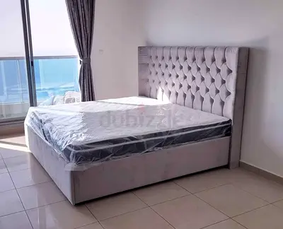 Elegant Velvet Upholstered Bed with Tufted Headboard