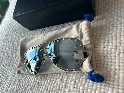 Authentic Louis Vuitton Sunglasses in Original Case (needs little repair)
