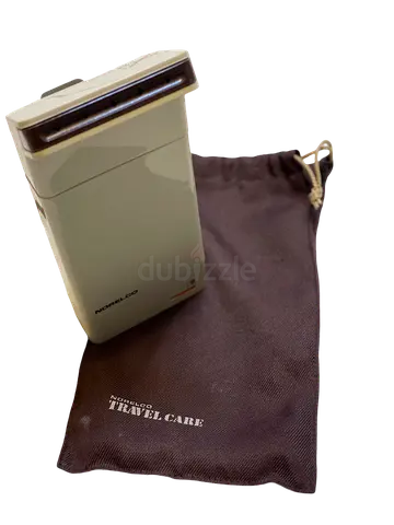 Compact and Portable Travel Steamer for Wrinkle-Free Clothes