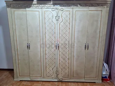 Elegant Vintage Wardrobe with Intricate Detailing