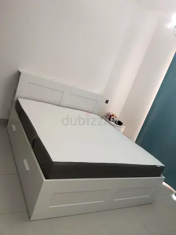 IKEA brimness king size bed with 4 storage drawers underneath and with  IKEA mattresss
