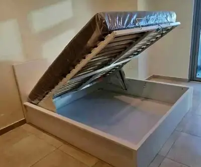 Ikea hydraulic queen size bed frame with storage inside full bed and with Ikea pocket sprung  mattre