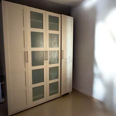Spacious White Wardrobe with Glass Panels