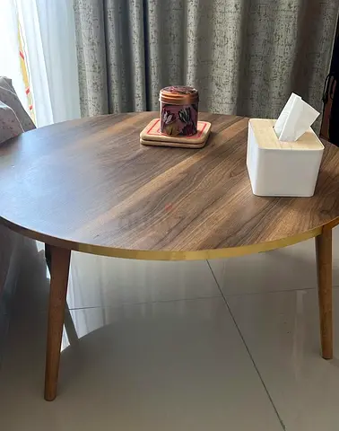 Charming Round Coffee Table with Gold Accents