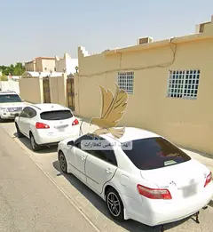 Villa for sale in Mansoura, corner lot, 11,000 sq ft, divided into two sections with separate electr