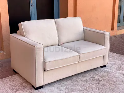 Cozy Two-Seater Sofa in Cream Color