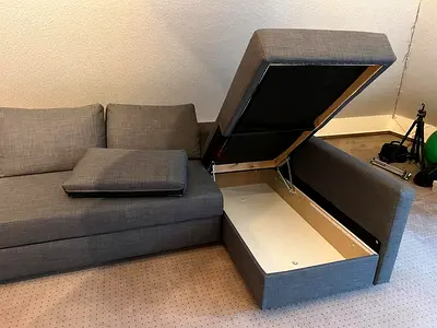 Stylish and Functional Grey Sofa with Storage
