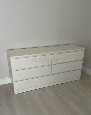 Sleek White Dresser with Ample Storage