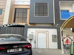 Townhouse villa for sale in Ajman, Al Yasmeen area 5 rooms, a living room and a hall Required 1,180,
