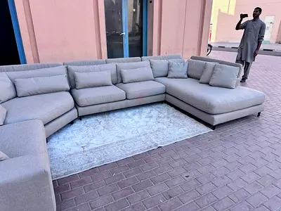 Comfortable L-Shaped Sofa with Cushions