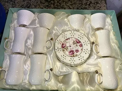 Elegant White Porcelain Tea Set with Floral Design