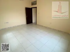 Two bedrooms and a living room for annual rent in Sharjah, Al Qasimia, in Al Naqbi building. Rent is