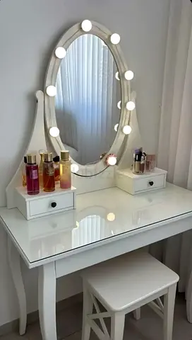 Vanity with mirror and chair
