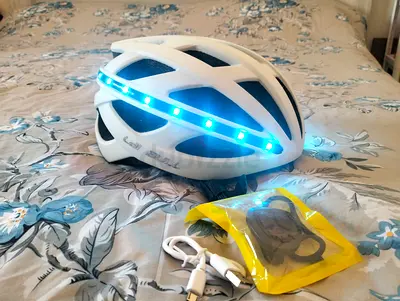 Brand New Rechargeable Cairbull Helmet with different colours light around and remote for it