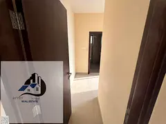 For annual rent in Ajman: Two bedrooms and a living room in Al Muwaihat 3, second tenant.