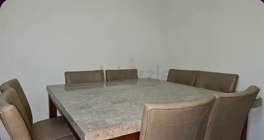 Elegant Marble Dining Table with Comfortable Chairs