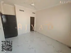 For rent: 2 bedrooms hall in Al Jurf 3 Ajman, 1500 sq ft, spacious layout, family-friendly building,