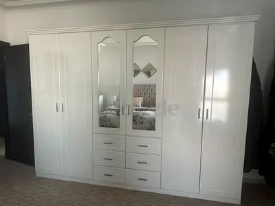 Elegant White Wardrobe with Ample Storage