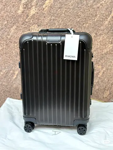 Rimowa black luggage