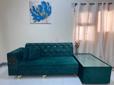 Elegant Green Velvet Sofa with Coffee Table