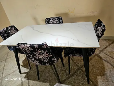 Elegant Dining Table with Stylish Chairs