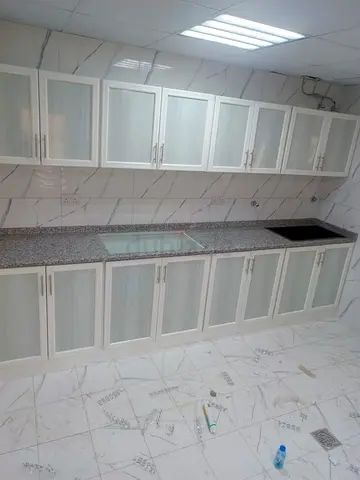 Modern White Kitchen Cabinets with Elegant Finish