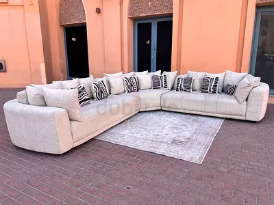 Comfortable L-Shaped Sofa with Cushions