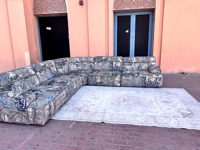 Comfortable Upholstered Sectional Sofa and Elegant Area Rug Set