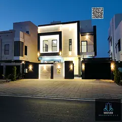 A luxurious modern villa for sale in Al Helio 2 area - Ajman, featuring a luxurious modern design an