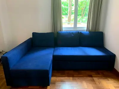 IKEA-Friheten L-shape sofa-bed with storage blue
