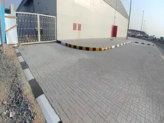 For sale: Warehouse complex in Al Sajaa Al Hanoo Al Qadeem, Block 4, prime location, area 32,879 sq